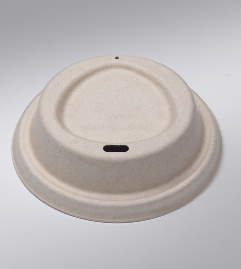 Plant-based compostable coffee lid made from upcycled hemp fiber, perfect for disposable hot beverage cups.