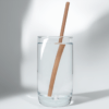8-inch long, 6mm wide compostable hemp straws in a glass of water